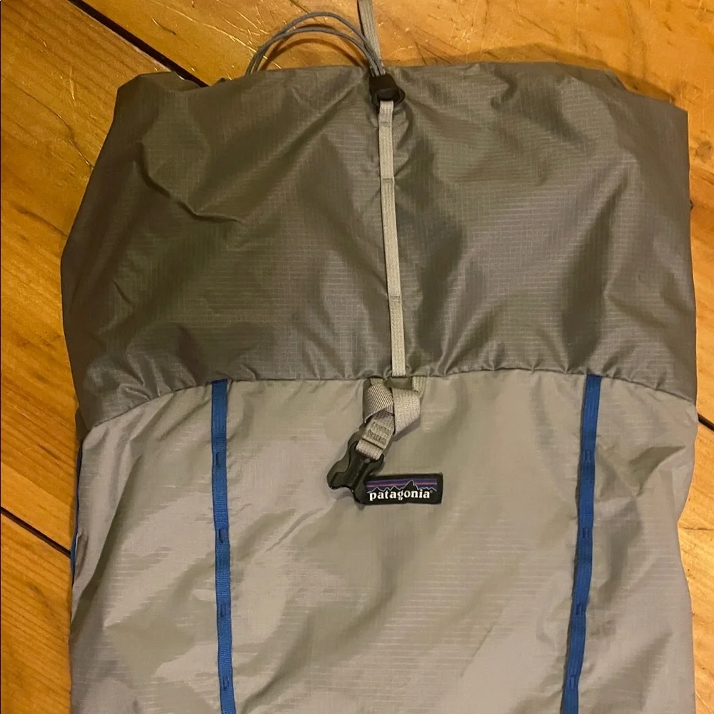 Patagonia Light Gray Backpack with Blue Accents